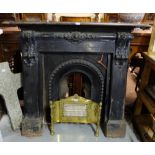 Victorian Cast Iron Fireplace with corbels – 55”w x 48”h and a cast iron insert (14”opening)