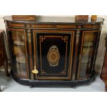 Edw. Ebonized Credenza, with bowed glass ends, heavily inlaid, with gilt mounts, on turned feet,