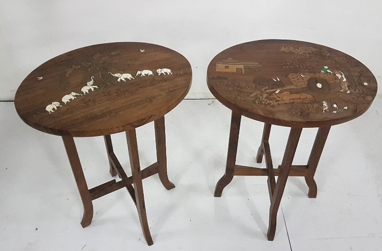 Similar Pair of low Occasional Tables, Indian rosewood, with elephant etc patterns, each 15” dia x