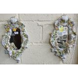 Matching Pair of ornate scroll-shaped porcelain Wall Mirrors,