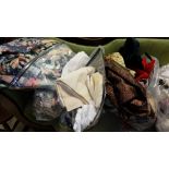 3 bags of coloured materials incl. 1 pair of curtains, table cloths, fabric remnants etc