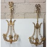 Matching Pair of Gilt Wall Sconces with ribbon shaped tops and lyre backs, each with 5 branches,