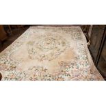 Large Chinese Wool Carpet, pink ground, green floral borders, centre floral medallion, 3.7m x 2.8m
