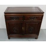 Chinese hardwood Side Cabinet, with 2 apron drawers over two doors enclosing shelves, carved with