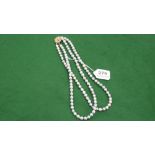 Grey Pearl Necklace with 14ct Stone Set floral Clasp (one stone missing), 18” long