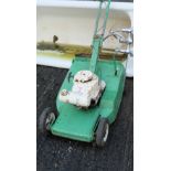 Old Vaspera Petrol Mower, painted green