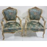 Matching pair of decorative carved wood Armchairs, cream with gold highlights with floral design