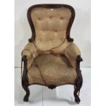Late 19th C Mahogany framed Library Armchair, a curved back with scrolled arms and similarly