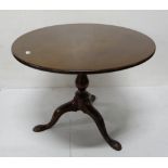 Mahogany low size circular Snap Top Occasional Table, on tripod base, large pad feet, labelled