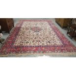 Large “Chinese Wool” cream ground Floor Rug, with a central bird pattern medallion and similarly