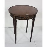 Circular Occasional Table, in the French Style, with a brass gallery, on narrow turned and reeded