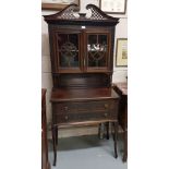 Edw. Mahogany Display Cabinet, a swan neck pediment over two glazed doors above a cabinet with 2