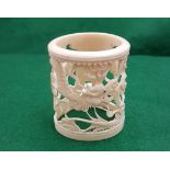 Carved ivory ornament, in the form of dragon figures, 3”h & a decorative circular bone stand (2)