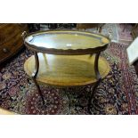 Edwardian Oval Shaped 2-Tier Tray Top Occasional Table, on tapered legs with c-shaped stretchers,
