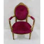 Continental style Carved Wood Salon Armchair, painted gold, with pink fabric covered seat and oval