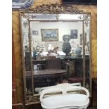 Large Fine Quality Continental Wall Mirror, the floral decorated upper finial over bevelled glass