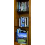 2 shelves of golfing interest books, 2 golfing prints & a shelf of Irish sporting interest – GAA