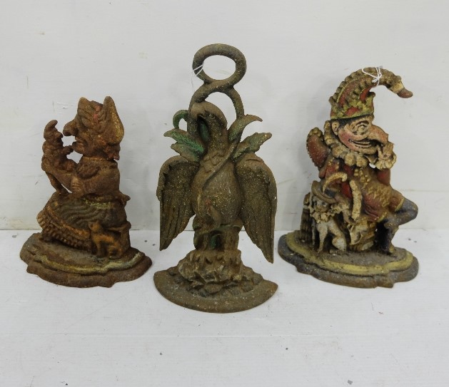 Victorian metal Door Stop in form of eagle and 2 later metal Door Stops, Punch and Judy (3)