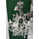 7 branch Glass Chandelier with multiple teardrop shaped cut crystals and swag shaped beadwork (one