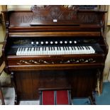 Pedal operated Wind Organ in a clean mahogany case with music stand, "Thomas Organ & Piano Co,