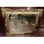 Gilt Framed Wall Mirror, in an ornately carved frame, featuring acanthus patterns and floral