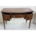 Late 19th C Mahogany Hall/Side Table, with a bowfront centre, three apron drawers, with circular