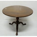 Mahogany low size circular Snap Top Occasional Table, on tripod base, large pad feet, labelled