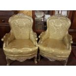Pair of Continental carved wood and gilt decorated Armchairs, scrolled arms and feet, gold/green