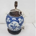 Chinese style porcelain Lamp, blue ground with white peonies and lamps, electric, converted from a