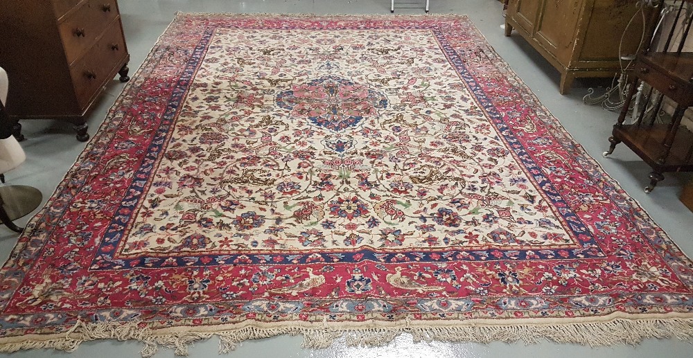 Large “Chinese Wool” cream ground Floor Rug, with a central bird pattern medallion and similarly