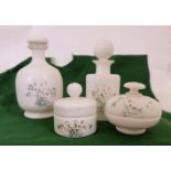 4 opalene glass perfume and powder bottles, hand painted with floral designs
