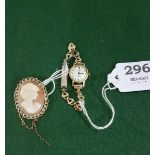 Cameo style in a 9ct oval brooch (hall marked) and Lady’s 1/10 12ct rolled gold watch, white