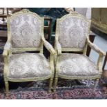 Matching pair of Continental carved gilt wood frame Armchairs, gold with green hues on turned