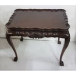 Irish Georgian Design Mahogany Centre Table, with a scalloped shaped rim, and shell design motif, on