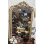 Late 19th C Large Gilt Mirror, with scallop shell shaped cartouche and raised floral and beaded