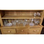 Shelf of Glassware – champagne glasses, punch glasses, decanters etc