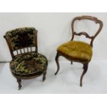 Low Victorian walnut Nursery Chair with floral padded back and sprung seat, turned front legs, on