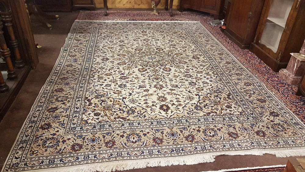 Cream Ground Persian Kashan Carpet, with a traditional Iranian design and blue borders, 3.42m x 2.