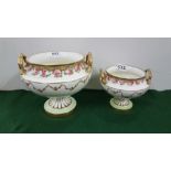 2 graduating Cauldron Dishes, raised on fluted bases, red floral pattern