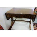 Mahogany early 20thC Sofa Table with drop end leaves, 2 apron drawers and 2 faux drawers, on 4