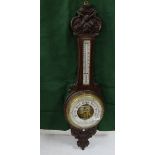 Oak cased wall mounted aneroid Barometer, stamped WEIR & SONS, DUBLIN, carved oak frame, 89cm h