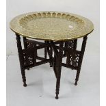 Benares circular Brass Table on a wooden folding stand, 60cm dia