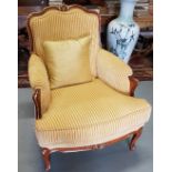 Large Continental Style Armchair, mahogany frame with gilt highlights and cabriole legs, covered