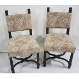 Pair of early 20thC Oak Side Chairs, with padded backs and seats, with Bacchus design finials,