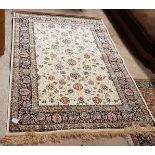 Ivory ground Kashmir Rug, all over floral design, multiple blue borders, 1.7 x 1.2m