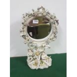 Ornate porcelain framed Table Mirror, circular bevelled insert over 3 musical cherubs, with multiple