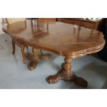 Dining Suite incl. a continental walnut design Dining Table on a twin pedestal base (66”l x 40”w)