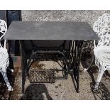 Grey Granite Topped Garden Table on a metal Singer sewing machine base