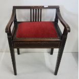 Edw. Mahogany Piano Stool, with line inlay, a hinged seat, on tapered legs, red fabric covered