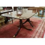 Good quality Georgian style mahogany Extending Dining Table with two leaves, polished brass toes,